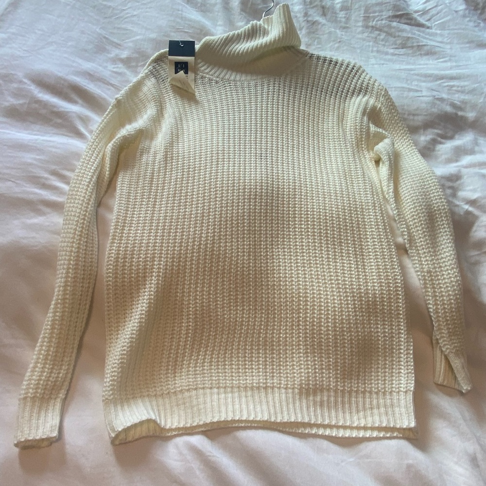 White turtleneck sweater